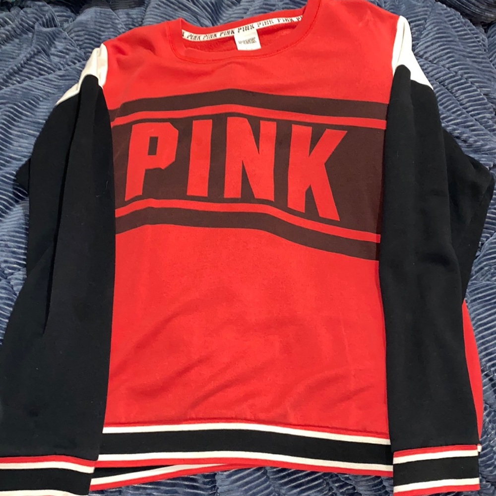 sweatshirt, red and white with small stains on back of arms of sleeve as shown